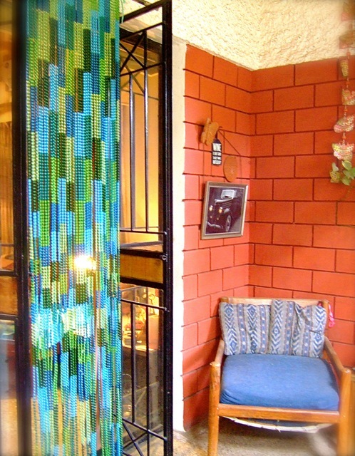 home staging mosaic blue green beaded room divider